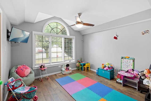 18049 Brittany Ln, Lansing, IL 60438 - recreation room featuring healthy amount of natural light, a ceiling fan, wood finished floors, and lofted ceiling