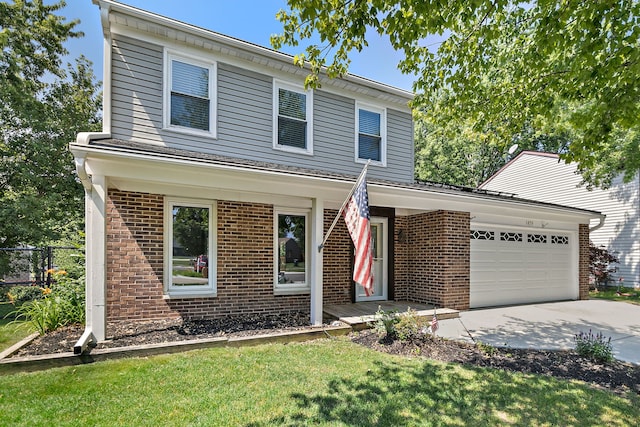 1479 Exeter Ct, Hoffman Estates, IL 60010 - traditional-style home with brick siding, an attached garage, and driveway