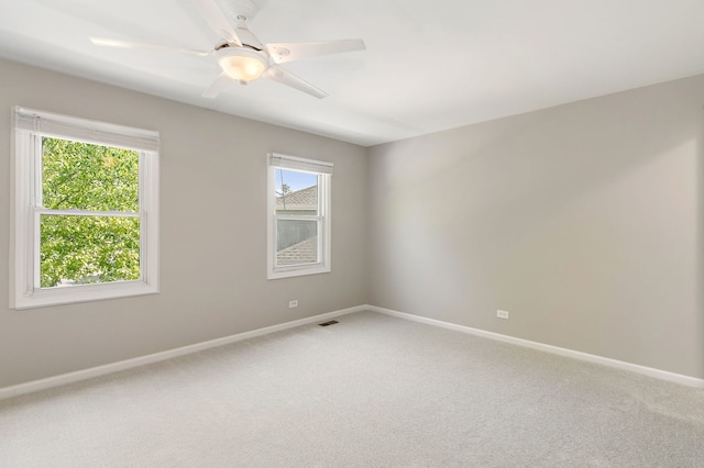 1479 Exeter Ct, Hoffman Estates, IL 60010 - empty room featuring light colored carpet and a ceiling fan