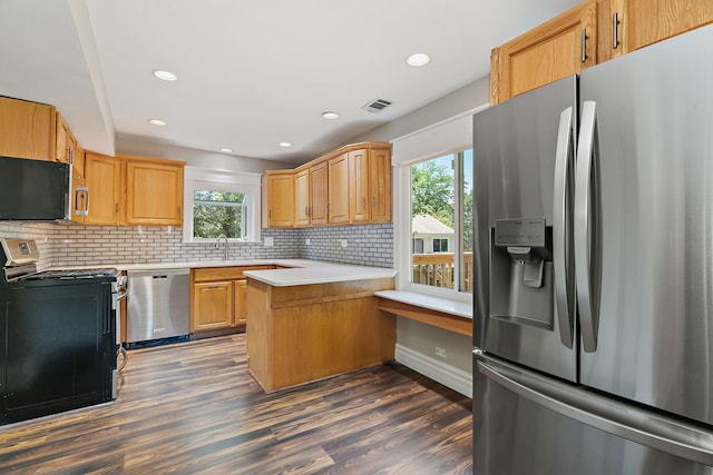 1479 Exeter Ct, Hoffman Estates, IL 60010 - kitchen with black appliances, a peninsula, backsplash, dark wood finished floors, and light countertops