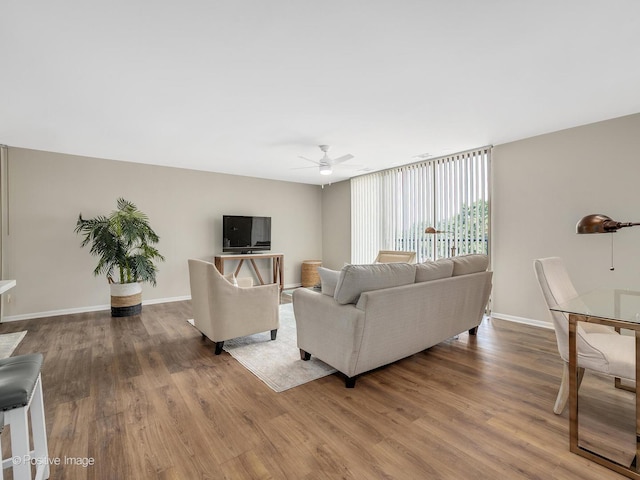 123 Acacia Cir Unit 414, Indian Head Park, IL 60525 - living area featuring a ceiling fan and wood finished floors