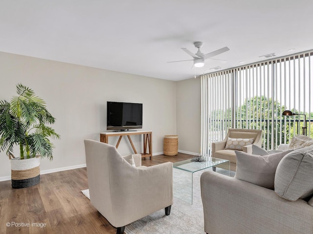 123 Acacia Cir Unit 414, Indian Head Park, IL 60525 - living area featuring wood finished floors and a ceiling fan