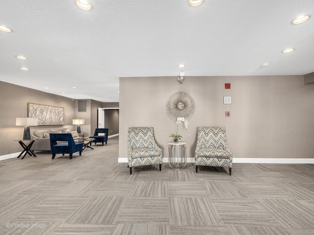 123 Acacia Cir Unit 414, Indian Head Park, IL 60525 - living area with carpet flooring, recessed lighting, and a textured ceiling