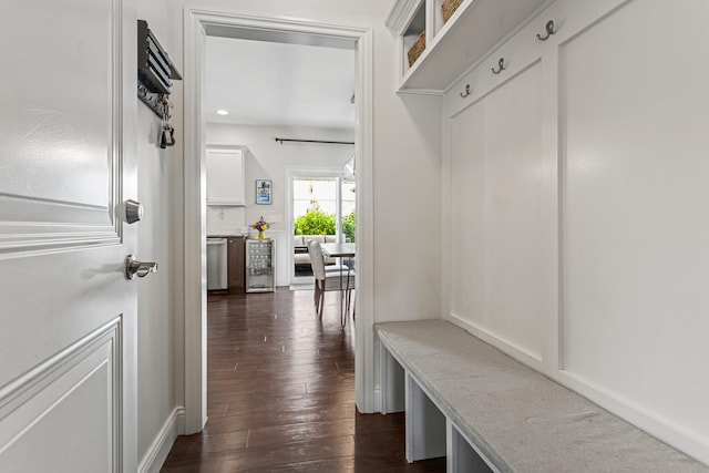 806 Cole Ln, Mahomet, IL 61853 - mudroom featuring dark wood-type flooring and wine cooler
