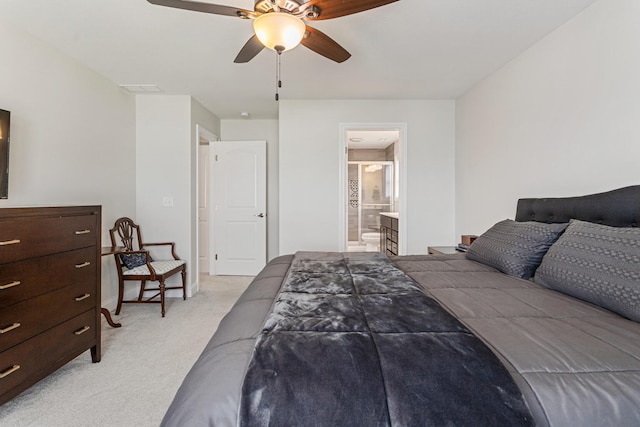 806 Cole Ln, Mahomet, IL 61853 - bedroom with light carpet, connected bathroom, and ceiling fan