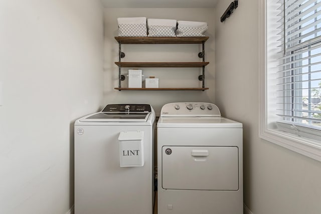 806 Cole Ln, Mahomet, IL 61853 - laundry area with washing machine and clothes dryer