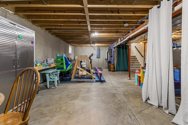 806 Cole Ln, Mahomet, IL 61853 - unfinished basement featuring stairway and electric panel