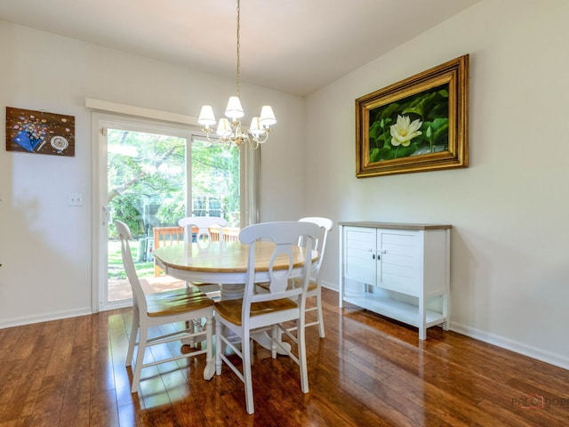 696 S Jade Ln, Round Lake, IL 60073 - dining room featuring hardwood / wood-style flooring and a chandelier
