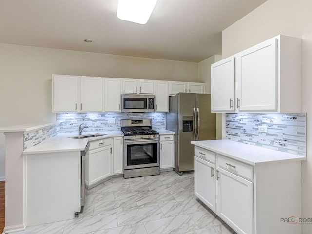 696 S Jade Ln, Round Lake, IL 60073 - kitchen featuring appliances with stainless steel finishes, decorative backsplash, and light marble finish flooring