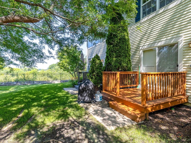696 S Jade Ln, Round Lake, IL 60073 - fenced backyard with a wooden deck