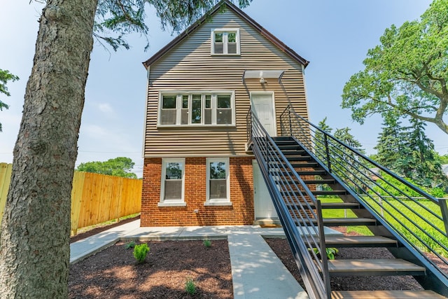 4438 S Knox Ave, Chicago, IL 60632 - view of front facade featuring stairs and brick siding
