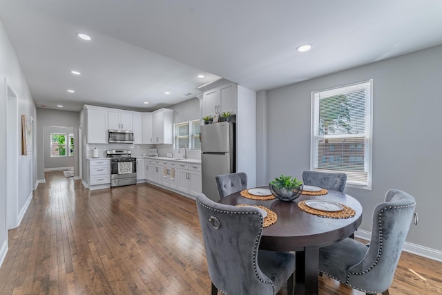 4438 S Knox Ave, Chicago, IL 60632 - dining room featuring dark wood-type flooring and recessed lighting