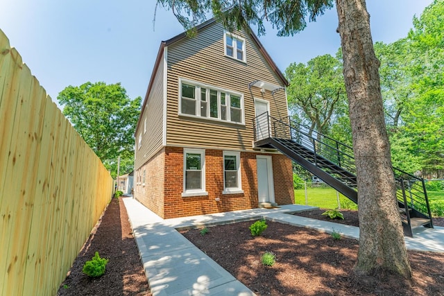 4438 S Knox Ave, Chicago, IL 60632 - view of front of property featuring stairs and brick siding
