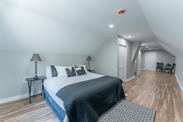 4438 S Knox Ave, Chicago, IL 60632 - bedroom with wood finished floors, vaulted ceiling, and recessed lighting