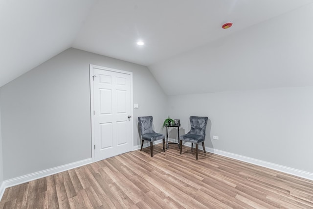 4438 S Knox Ave, Chicago, IL 60632 - sitting room with light wood-style floors and vaulted ceiling