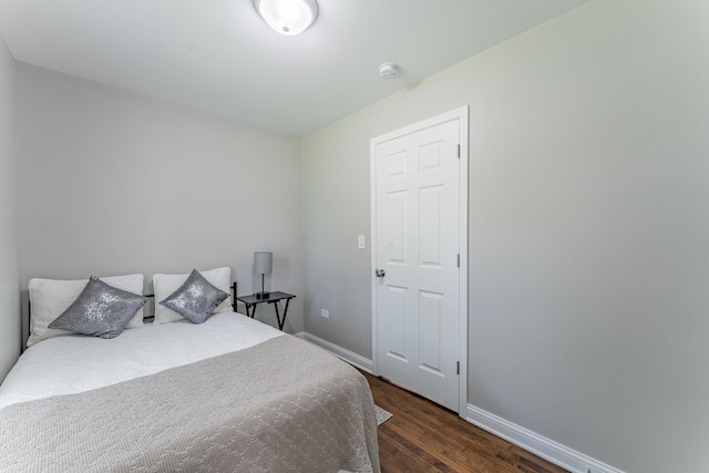 4438 S Knox Ave, Chicago, IL 60632 - bedroom featuring dark wood-style flooring and baseboards