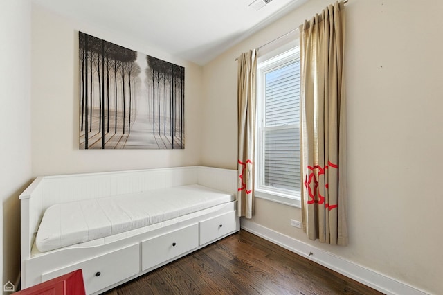 2314 N Mango Ave, Chicago, IL 60639 - bedroom featuring dark wood-type flooring and baseboards