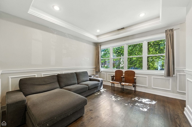 2314 N Mango Ave, Chicago, IL 60639 - living area with a tray ceiling, a decorative wall, wainscoting, dark wood-style floors, and recessed lighting