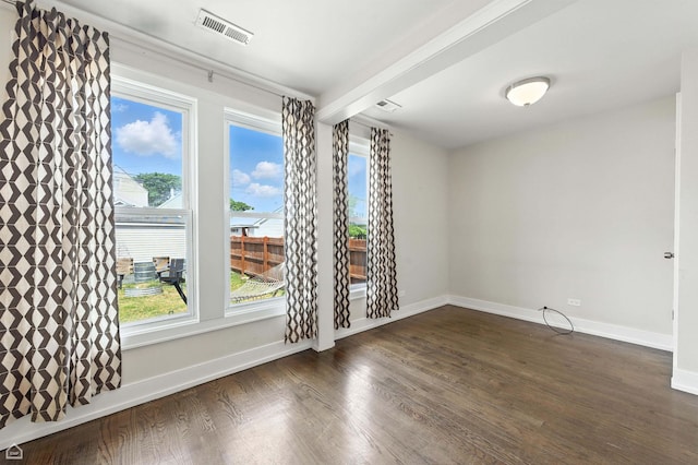 2314 N Mango Ave, Chicago, IL 60639 - empty room with dark wood-style floors and baseboards