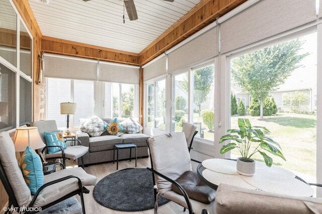1029 Carolina Ct, Pingree Grove, IL 60140 - sunroom / solarium featuring a ceiling fan, wood finished floors, and an outdoor hangout area