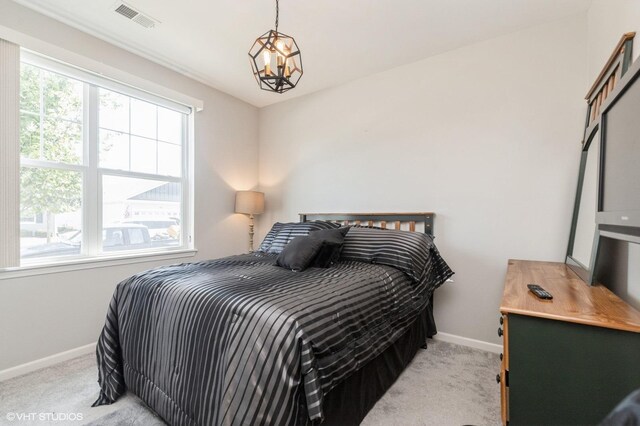 1029 Carolina Ct, Pingree Grove, IL 60140 - bedroom featuring light colored carpet, multiple windows, and a chandelier