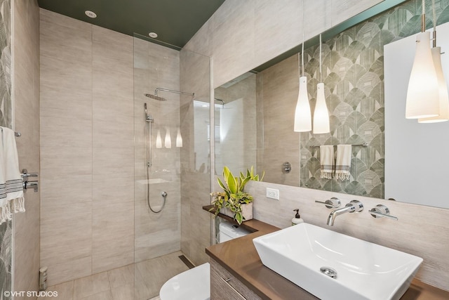 1547 N Wood St Unit 2, Chicago, IL 60622 - bathroom with tile walls, walk in shower, and vanity
