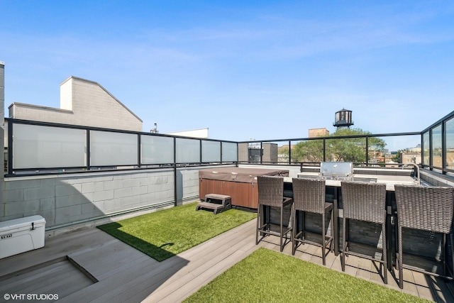 1547 N Wood St Unit 2, Chicago, IL 60622 - view of green lawn featuring area for grilling, a hot tub, a wooden deck, and a bar