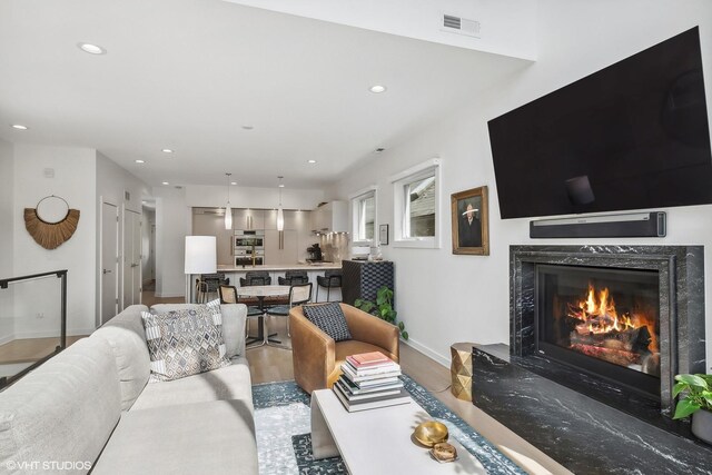 1547 N Wood St Unit 2, Chicago, IL 60622 - living room with a fireplace, recessed lighting, and wood finished floors