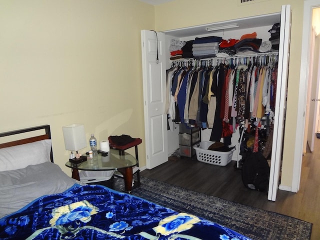 1931 Prairie Sq Unit 329, Schaumburg, IL 60173 - bedroom featuring wood finished floors and a closet