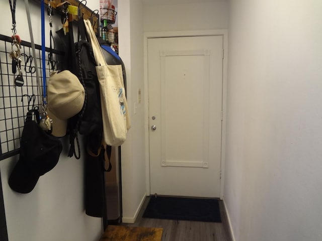 1931 Prairie Sq Unit 329, Schaumburg, IL 60173 - doorway featuring dark wood finished floors and baseboards