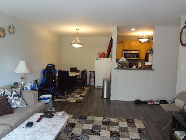 1931 Prairie Sq Unit 329, Schaumburg, IL 60173 - living area featuring dark wood-style flooring