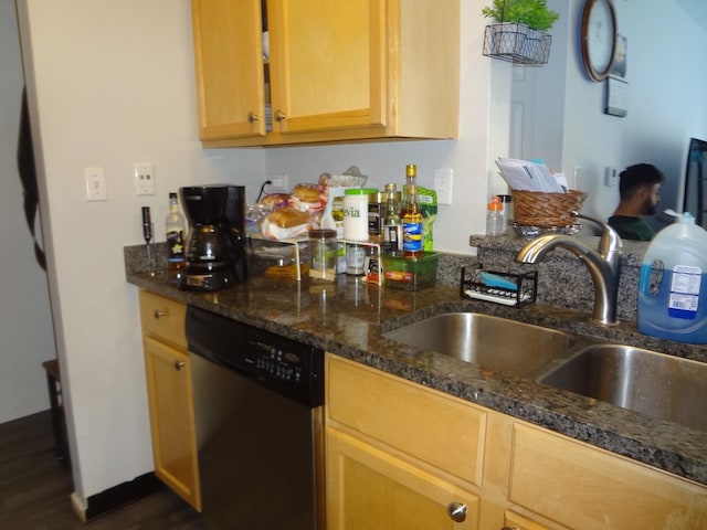 1931 Prairie Sq Unit 329, Schaumburg, IL 60173 - kitchen with stainless steel dishwasher, dark stone countertops, and dark wood-style flooring