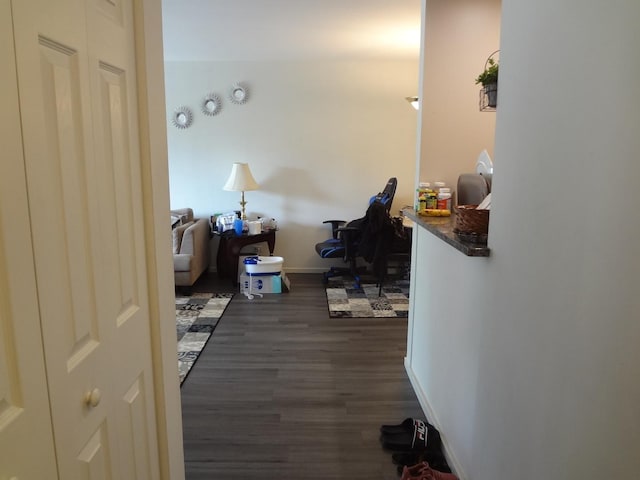 1931 Prairie Sq Unit 329, Schaumburg, IL 60173 - corridor featuring dark wood-style floors and baseboards
