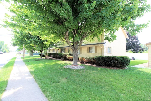 420 W N St, Bradley, IL 60915 - view of front of property with a front yard and brick siding