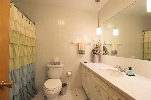 420 W N St, Bradley, IL 60915 - full bathroom with vanity, tile walls, and a shower with curtain