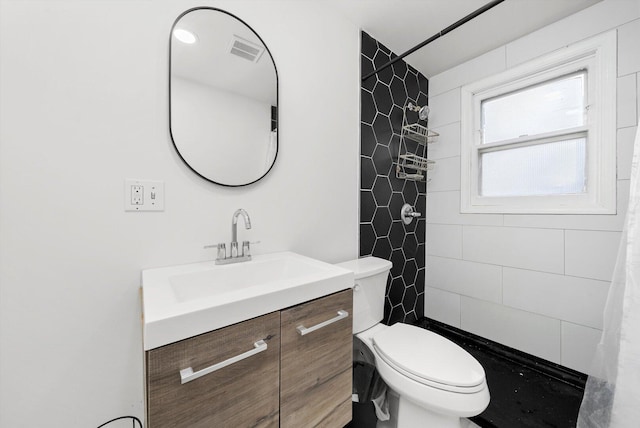 422 Locust St, Elgin, IL 60123 - bathroom with a tile shower and vanity
