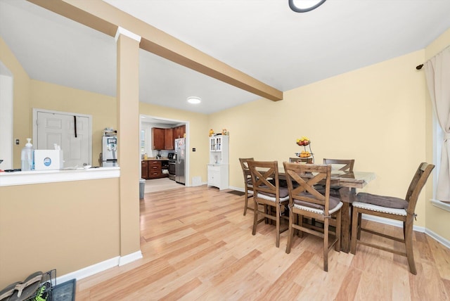 422 Locust St, Elgin, IL 60123 - dining space with light wood finished floors and baseboards