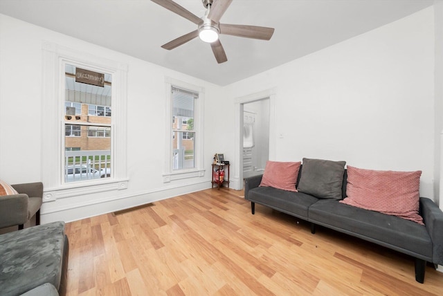 422 Locust St, Elgin, IL 60123 - living area with light wood-style floors and a ceiling fan