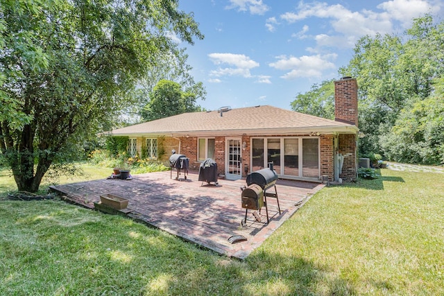 1717 Oak Lane Rd, Flossmoor, IL 60422 - rear view of property featuring a chimney, a yard, a patio, brick siding, and roof with shingles