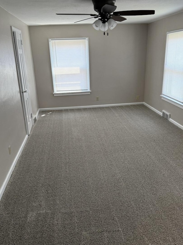 602 River Ln, Loves Park, IL 61111 - unfurnished room featuring carpet and ceiling fan