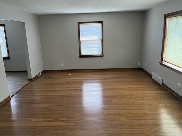 602 River Ln, Loves Park, IL 61111 - spare room featuring wood finished floors