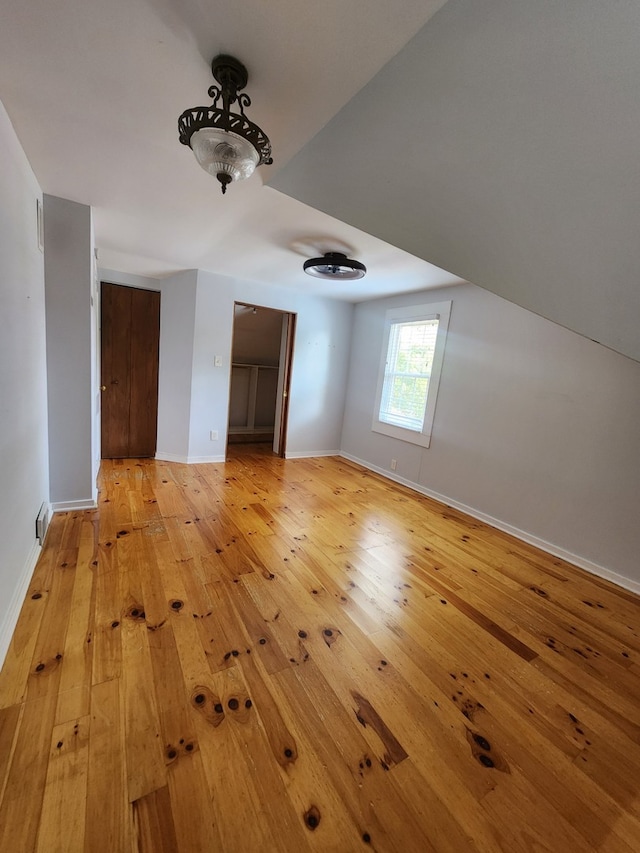 661 S Swain Ave, Elmhurst, IL 60126 - empty room with light wood-style floors and baseboards