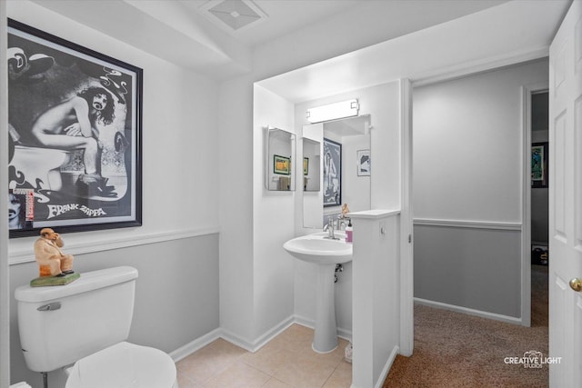 25 Cedar Ct, South Elgin, IL 60177 - half bath featuring toilet and tile patterned floors