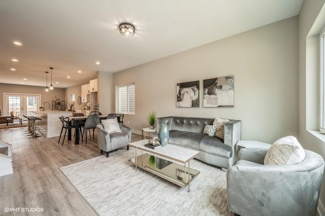 530 E 44th Pl, Chicago, IL 60653 - living area with light wood-style flooring, recessed lighting, and french doors
