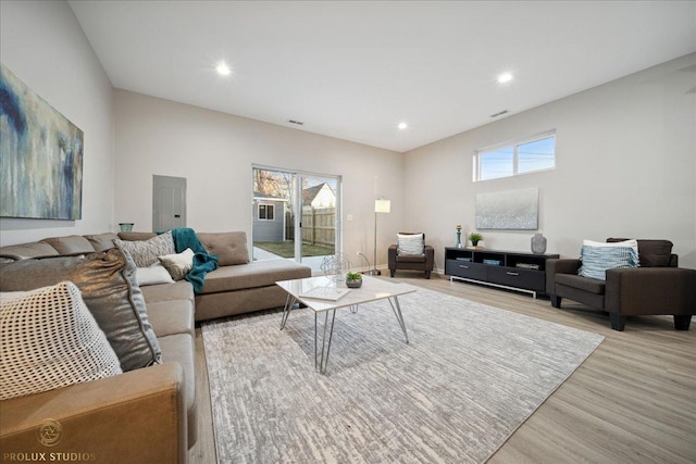 530 E 44th Pl, Chicago, IL 60653 - living room featuring electric panel, light wood finished floors, and recessed lighting