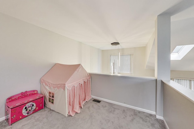 1996 Blackberry Ln, Hoffman Estates, IL 60169 - playroom with carpet flooring, a skylight, and healthy amount of natural light
