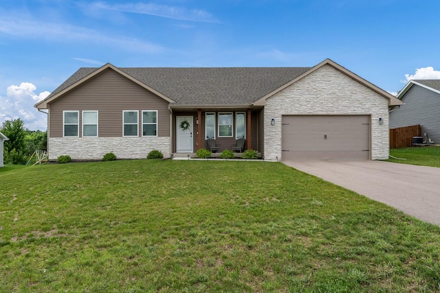 650 Anacostia Dr, Roscoe, IL 61073 - single story home with stone siding, a garage, driveway, and roof with shingles