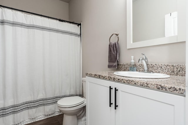 650 Anacostia Dr, Roscoe, IL 61073 - full bathroom with vanity, wood finished floors, and curtained shower