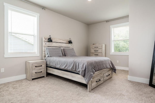 650 Anacostia Dr, Roscoe, IL 61073 - bedroom featuring baseboards and light carpet