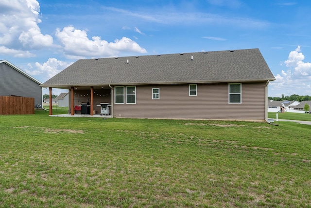 650 Anacostia Dr, Roscoe, IL 61073 - back of house with a patio area and roof with shingles